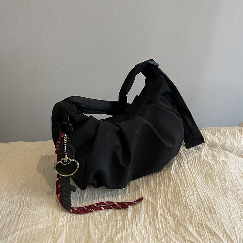 #308 New folding movement shoulder slung underarm croissants.