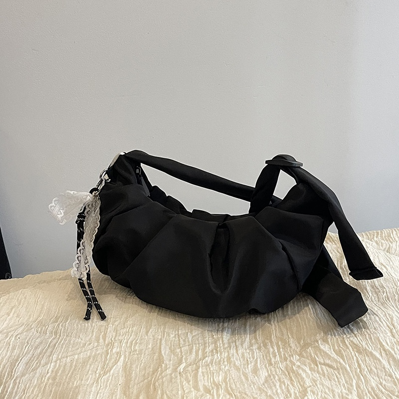 #308 New folding movement shoulder slung underarm croissants.